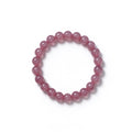 Natural 8mm Madagascar rose quartz beaded stretch bracelet on white background