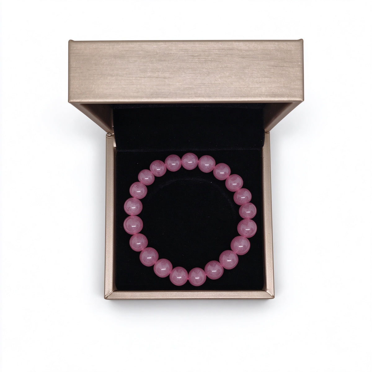 Madagascar rose quartz bracelet placed flat in luxury gift box with black velvet