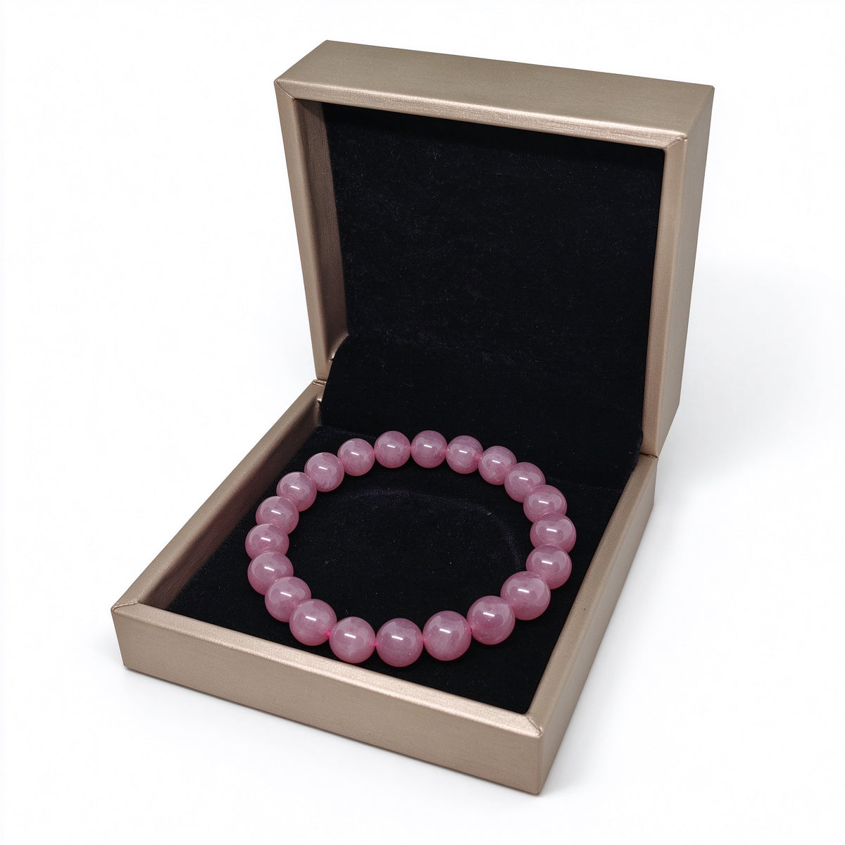 Perspective view of 8mm rose quartz beaded bracelet in open jewelry gift box