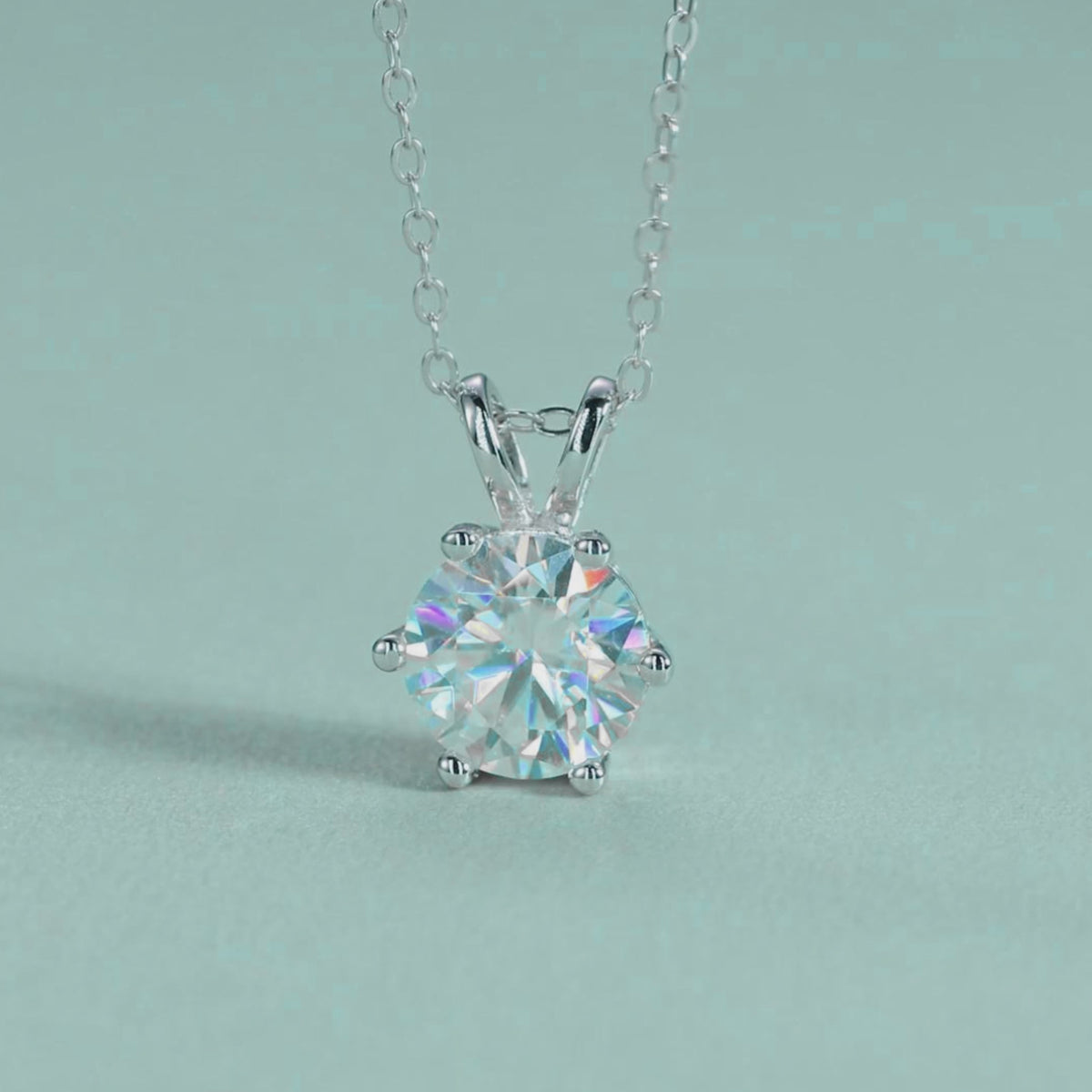 Video showing the sparkle and fire of 1.0ct round moissanite pendant necklace in motion