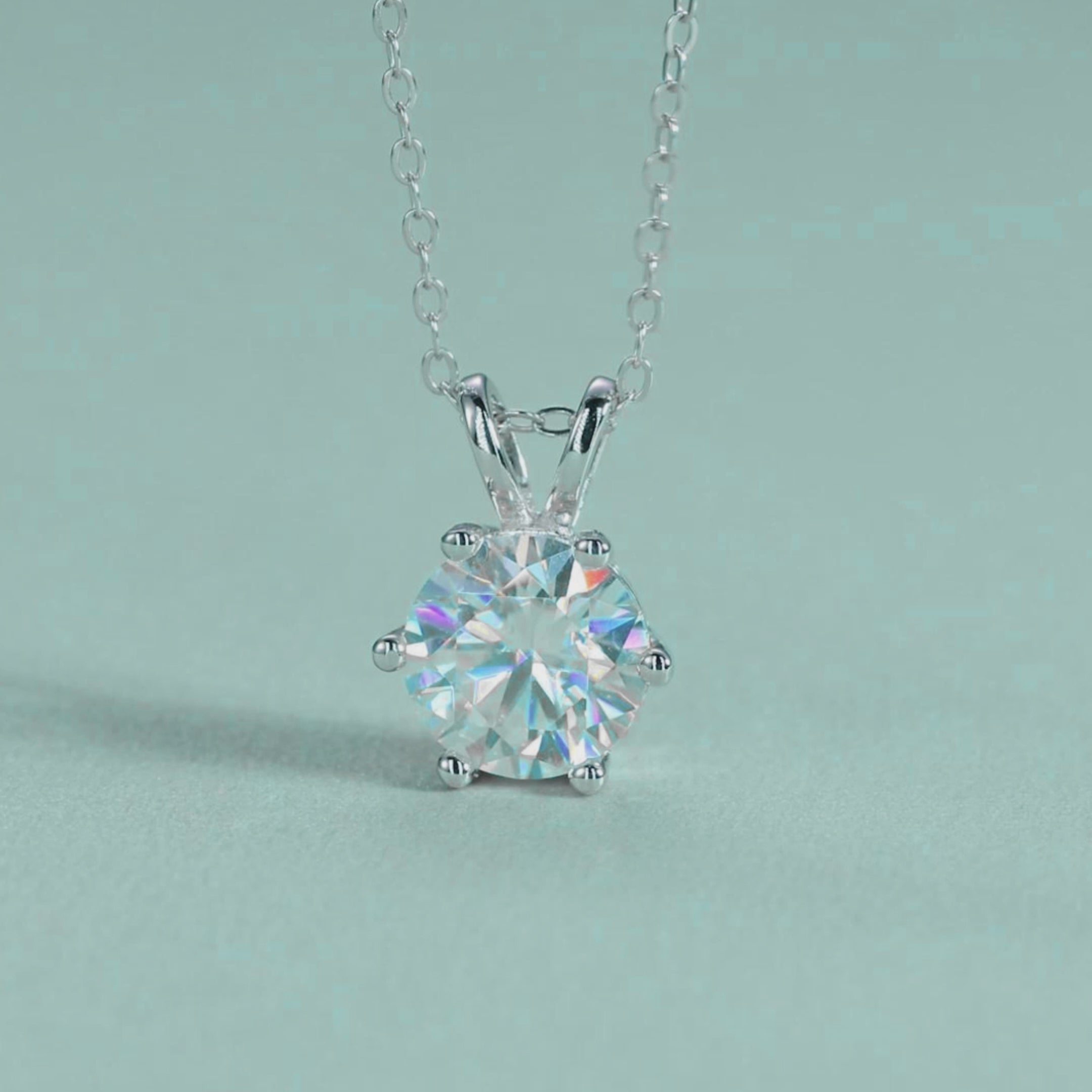 Video showing the sparkle and fire of 1.0ct round moissanite pendant necklace in motion