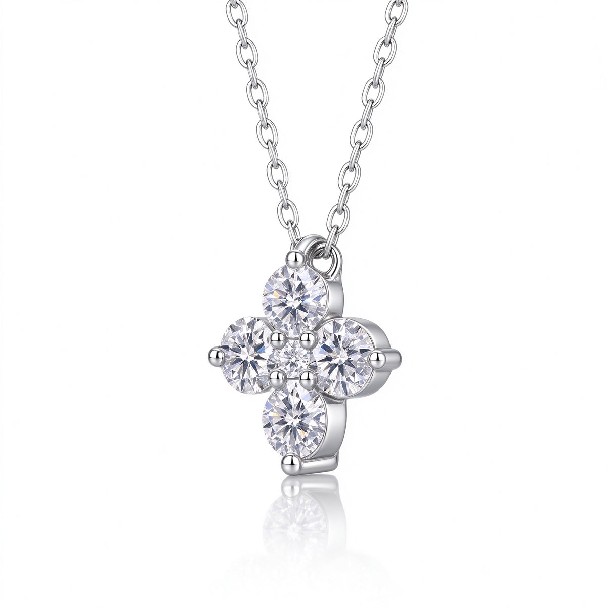 Side profile view of four-leaf clover moissanite cluster pendant and prong setting