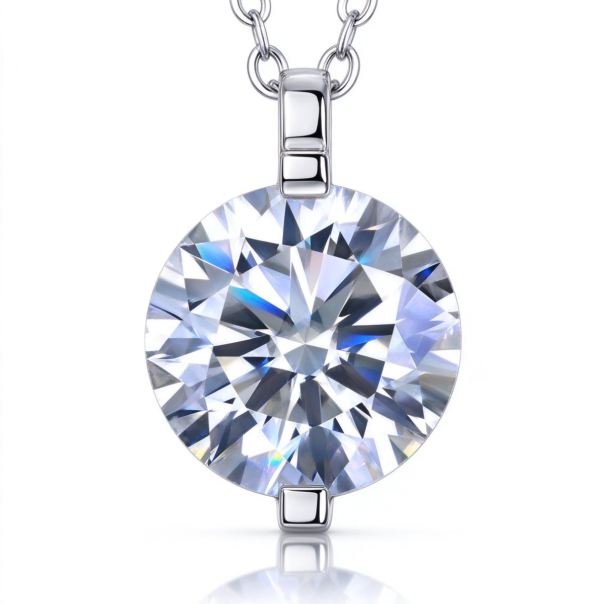 Macro close-up of 1.0 carat brilliant cut moissanite stone and North-South 2-prong tabs