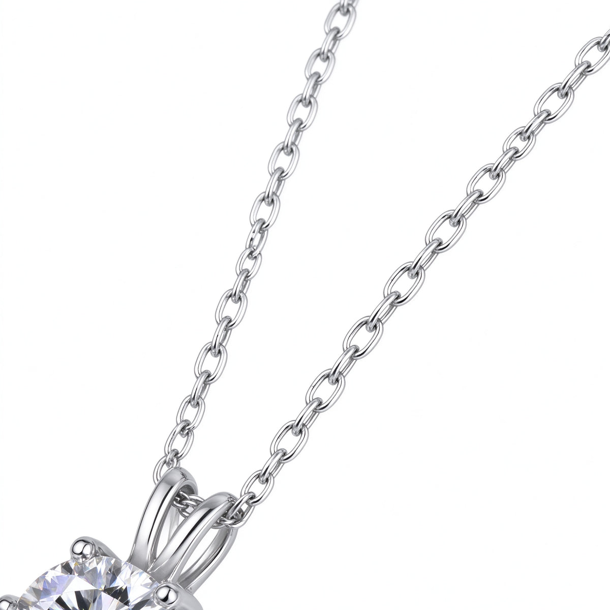 Detail of 925 sterling silver cable chain and polished bail for moissanite pendant