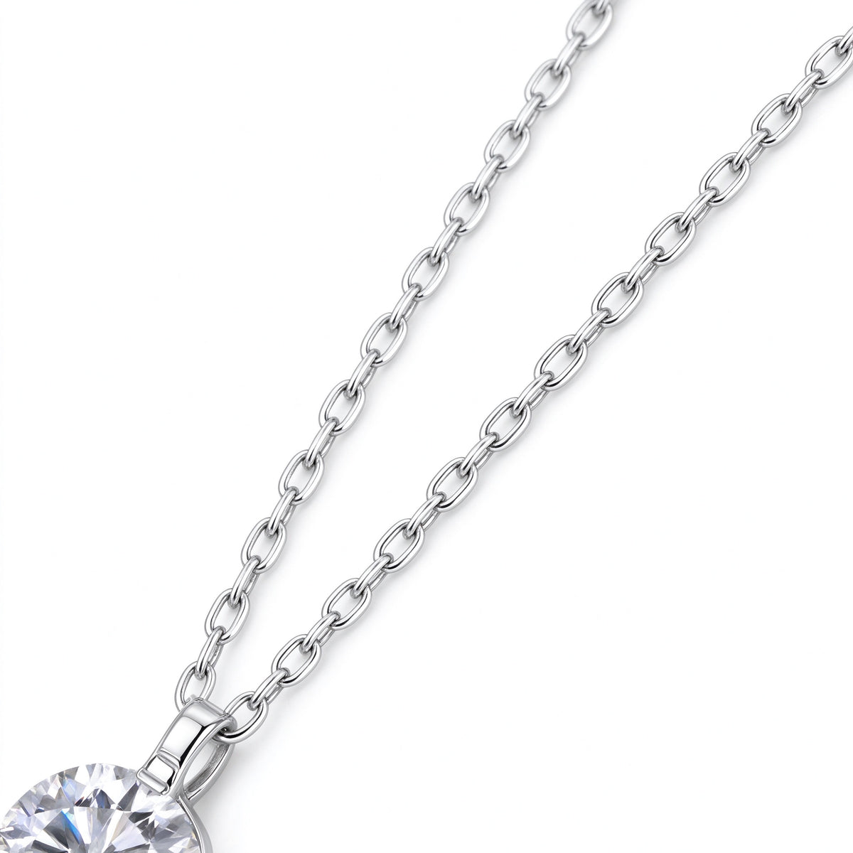 Detail of 925 sterling silver chain and streamlined geometric bail on 2-prong pendant